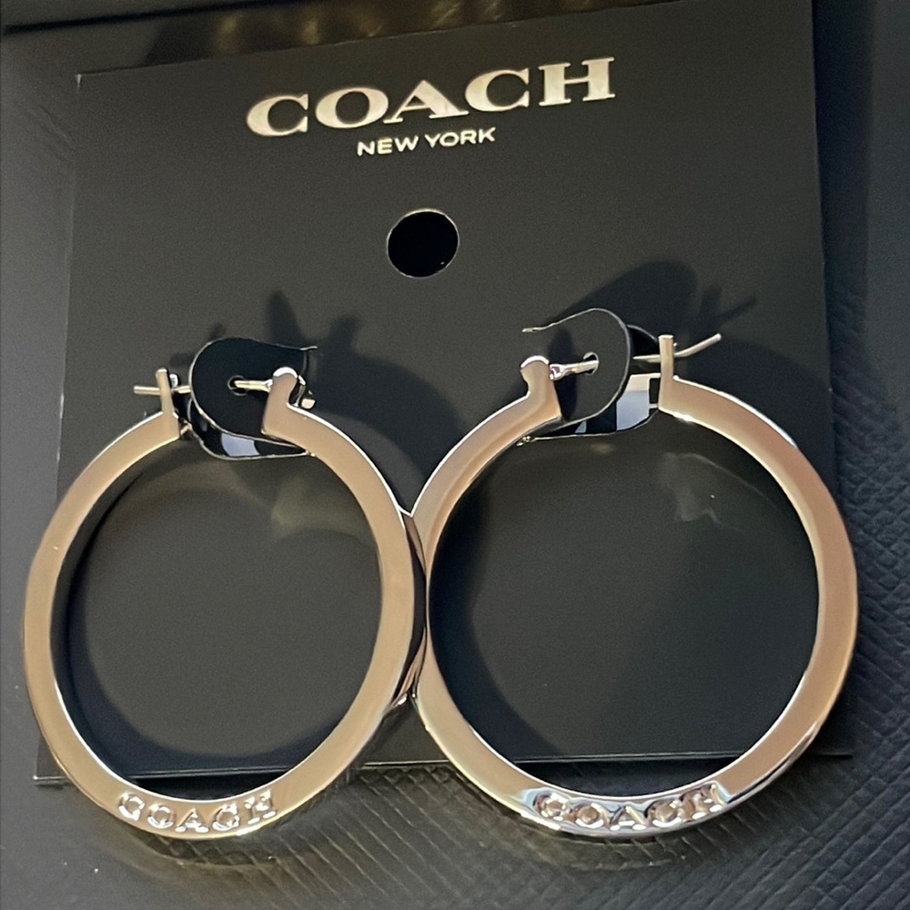 Coach silver hoop earrings.